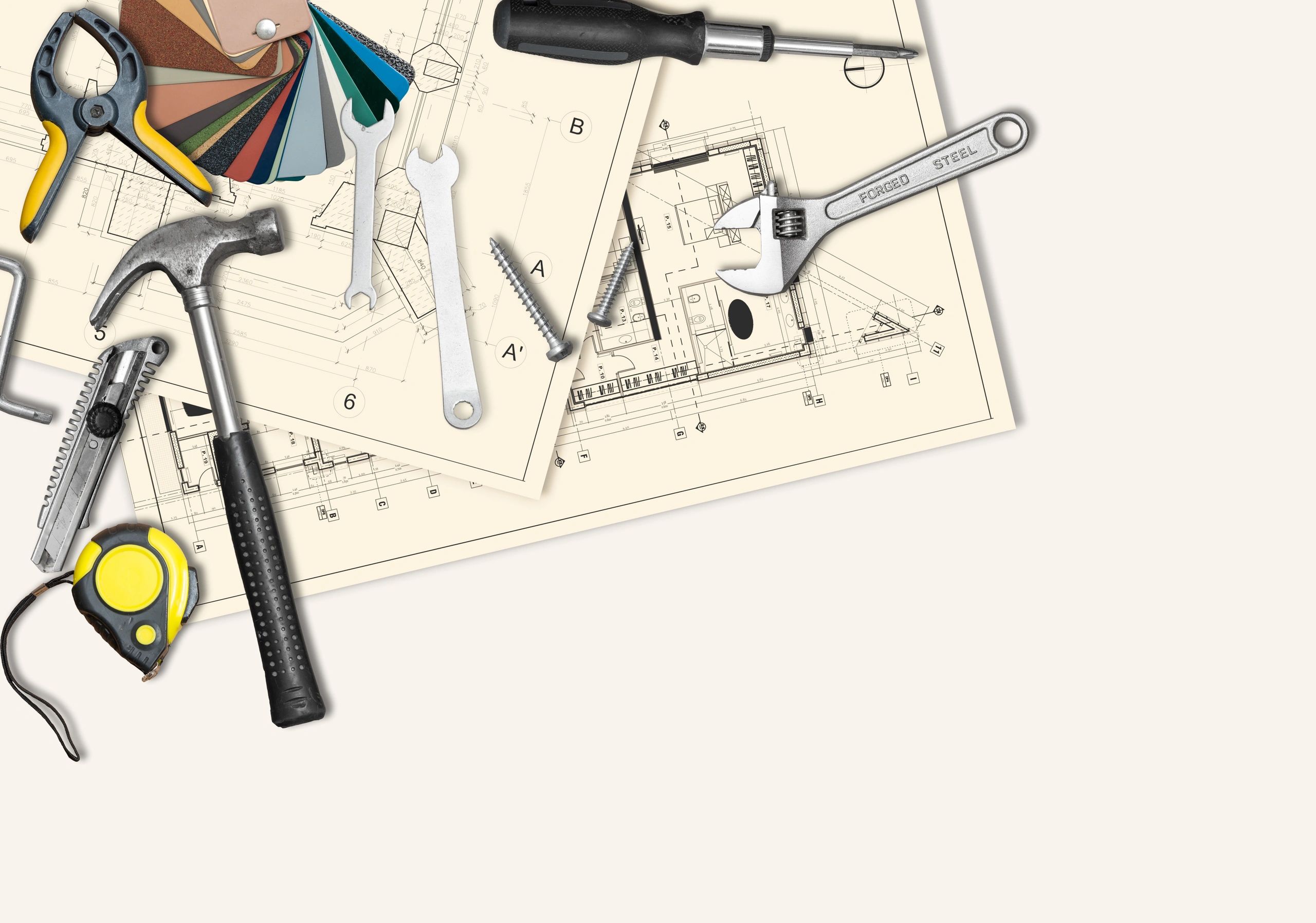 Construction tools and blueprints